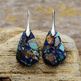 BOUCLES D'OREILLES PIERRE
