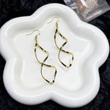 Spiral Dangle Earrings | Gold