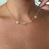 COLLIER AVEC INITIALE EN FORME DE CŒUR