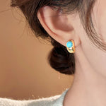 BOUCLES D'OREILLES INTEMPOREL TURQUOISE INCURVÉ CUIVRE