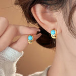 BOUCLES D'OREILLES INTEMPOREL TURQUOISE INCURVÉ CUIVRE