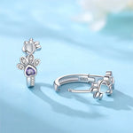 Paw Huggie silver earrings with cubic zirconia and heart-shaped gemstone