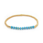 BRACELET VINTAGE TURQUOISE PERLÉ CROIX BRELOQUE