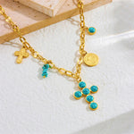 COLLIER EXCLUSIF INOXYDABLE ACIER TURQUOISE CROIX