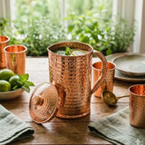 SAVOIR-FAIRE ARTISAN — CARAFE MARTELÉE EN CUIVRE