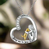 Silver heart necklace with dog and zirconia stones
