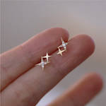 BOUCLES D'OREILLES RAYONNANT ÉTOILE