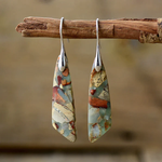 BOUCLES D'OREILLES PIERRE