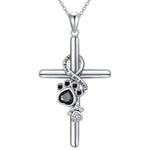 Silver paw and cross pendant necklace